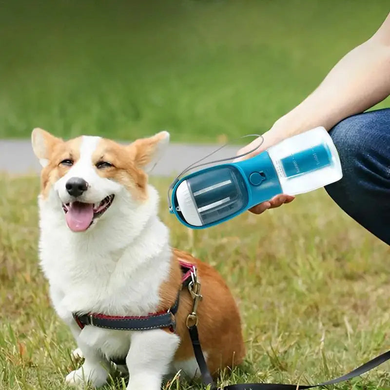 3-in-1 Pet Travel Water Bottle (300 ml) – Built-in Bowl, Treat Compartment & Waste-Bag Holder